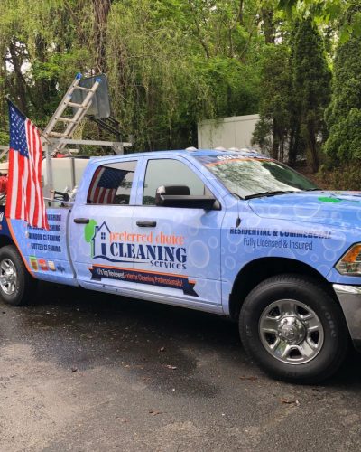 Preferred Choice Cleaning work truck with United States flag in back